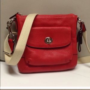 Coach leather swing pack.